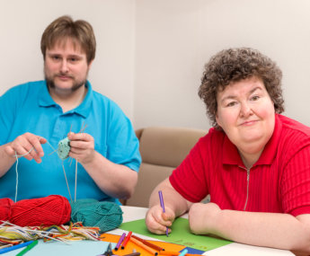 2 people with disabilities doing some activities