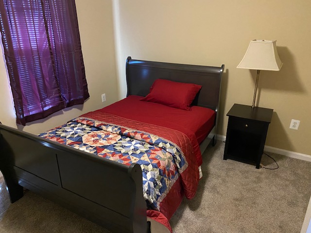 clean bedroom with 1 bed